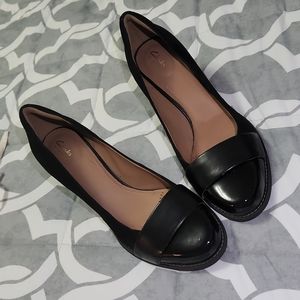 Clarks black high heels, measuring on the size of 8.5